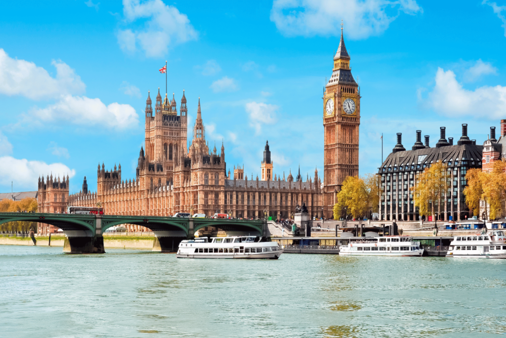 Big Ben clock tower in London with a clear blue sky background